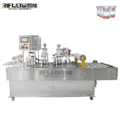 China Full Automatic Food Plastic Dye Liquid Multifunctional Film Cup Filling And Sealing Machine for sale