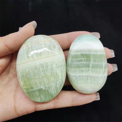 China China about 60-70MM Crystal Stone Caribbean Plam Stone for home decoration for sale