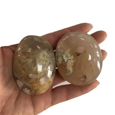 China China Cherry Blossom Agate Palm Stone Natural Hand Polished Wholesale Crystal Massage Egg for sale