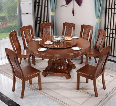 China Solid wood round table (the other) Chinese style adjustable large with turntable induction cooker dining table and chair combination home consumption for sale