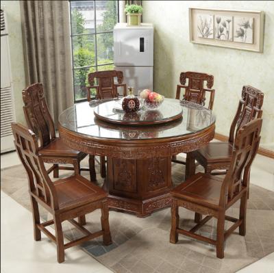 China Extendable all solid wood dining table and chair combination carved Chinese antique oak large round table 1.8 meters for sale