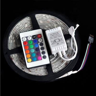 China Office led strip lights with adapter home decoration smd5050 led strip lights IP65 5 meters 300leds DC12V kit packing blister for sale