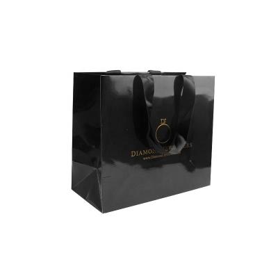 China Custom Recyclable Custom Paper Gift Bag Black Glossy Paper Mailing Bags For Clothing for sale