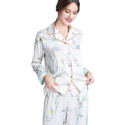 China Custom Logo Girl Printed Soft Satin Breathable Custom Pajamas Long Sleeve Pajamas Set Women Sleepwear Satin Pajamas for sale