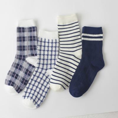 China comfortable fabrics wholesale custom sports happy houndstooth grid crew tube women's socks for sale