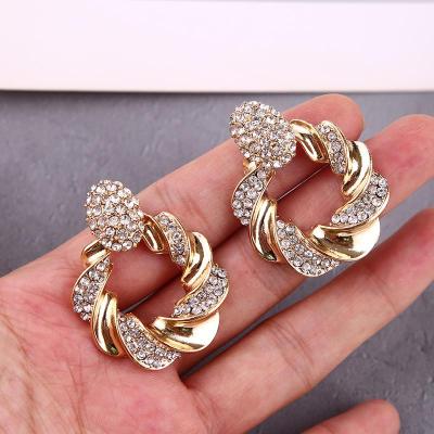 China TRENDY Geometric Spiral Inlaid Earrings Irregular Exaggerated Alloy Round Dangle Earrings for sale