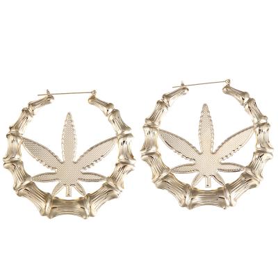 China Fashion Gold Maple Leaf Punk Stud Earrings For Women N2103310 Wholesale for sale