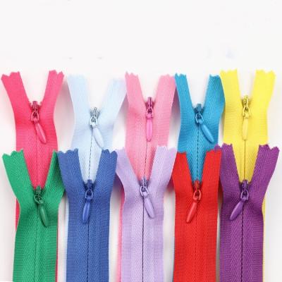 China Size 3#5 Kinds of Color Auto Lock Puller Nylon Invisible End-End Invisible Zipper for sale