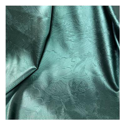 China 75D*150D Memory Twill Dyed 122cm Width African Bazin Style Pattern Embossed Garment Dresses Polyester Satin Fabric for sale