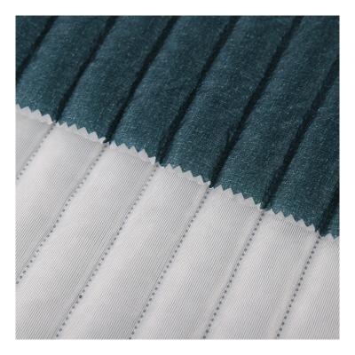 China Wholesale Memory Strips Cationic Fiber Pongee 100% Cotton Nonwoven Bundle Quilted Fabric For Jacket Coat for sale