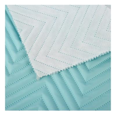 China Hotsale 100%cotton V-shaped memory stretching yardage cotton pongee quilted fabric for kids jacket coat for sale