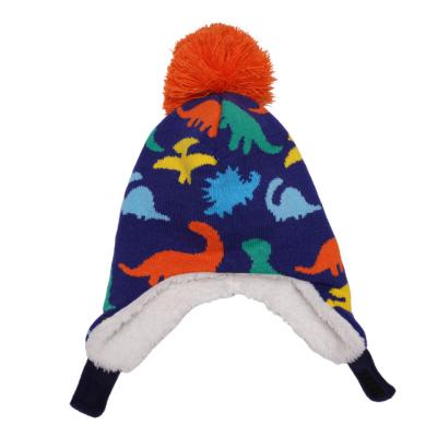 China COMMON Kids Knitted Hat Dinosaur Winter Beanie Hat Strap Thermal Fleece Pom Hat Ear Flaps Cap For Toddler Kids for sale