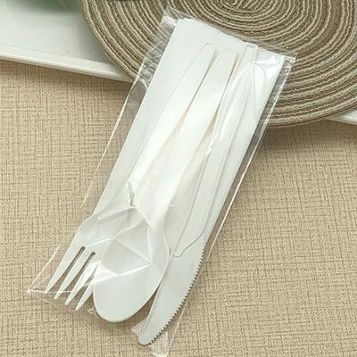 China 100% Eco Friendly Disposable Biodegradable PLA Disposable Biodegradable Plastic Cutlery Set With Napkin for sale