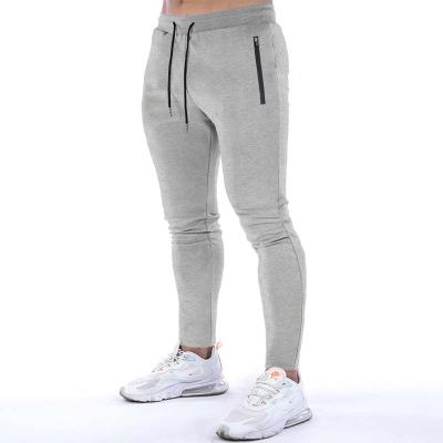 China Anti-Wrinkle OEM Men's Pants And Trousers Outdoor Sports Workout Track Pants With Side Pockets for sale