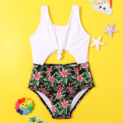 China 2022 Little Girls Removable Padded One Piece Swimsuit For Kids Hollow Out Floral Swimwear Girl Children Splicing Swimsuit for sale