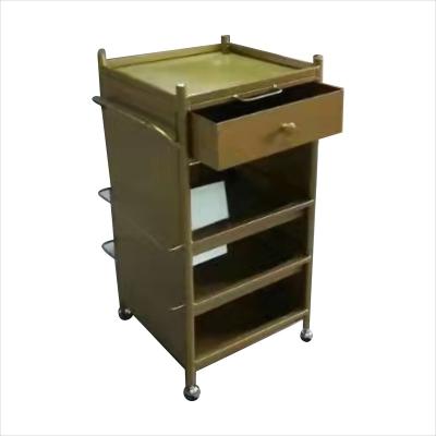 China 2022 Latest 5 Years Warranty Traditional Salon Furniture Trolley Manicure Pedicure Trolley Pedicure Trolley Gold Gloss Warranty for sale