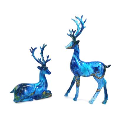 China Modern Europe Style Reindeer Statue Resin Sitting Standing Deer Statue Home Decor Sculpture for sale