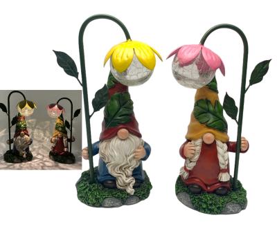 China Custom Funny Europe Christmas Gnomes Decoration Garden Gnomes Statue With Solar Flower Light for sale