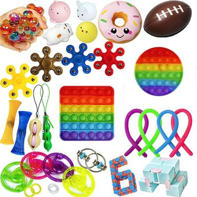 China 28pc Decompression Stir Sensory Toys Set Push Doll Toy Pack Box Mochi Squeeze Bean Pean Ball Stress Relief Toy Popt Bubble Snap Bundle for sale