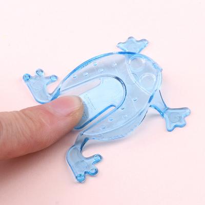 China Plastic Funny Jumping Frog Bounce Wiggle Person Toys Novelty Matching Stress Reliever Jump Frogs Toy For Kids Birthday Gift Gift for sale