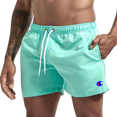 China Anti-Wrinkle Summer Custom Elastic Waist Shorts Polyester Active Gym Jogging 5 Inch Beach Surf Swim Inseam Shorts For Men for sale