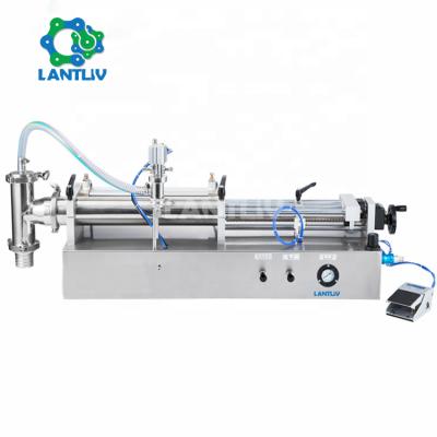 China Pneumatic machine head pedal paste filling machine 50-500ml double food horizontal cosmetic ration sauce soft drink without hopper for sale