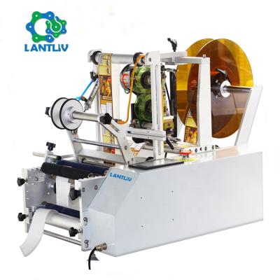 China Semi Automatic Food Small Eye Drops Bottle Self Adhesive Labeling Machines Horizontal Rotary Bulb Sticker Labeling Machine With Printer for sale