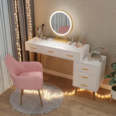 China Nordic modern dressing table with mirror and stool for bedroom dressing table with 3 LED light effect reflect iron gold dresser for sale