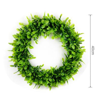 China Indoor Decoration Christmas Wreath Wreath Green Leaves Plastic Plants Preserved Boxwood Wreath for sale