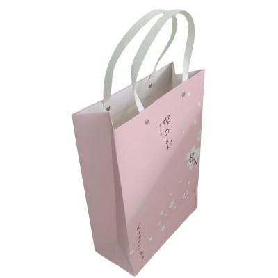 China 2021 Wholesale Gift China Guests Personalized Wedding Souvenir Gift Paper Bag Bow Gift Bag for sale