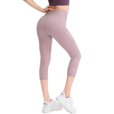 China 2021 High Waist Buttocks Yoga Pants Ladies Seamless Fitness Yoga Pants New Workout Clothes With Pockets Yoga Pants for sale