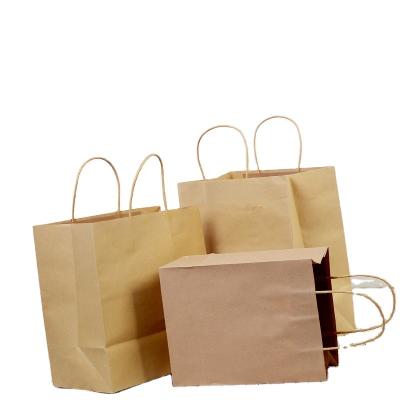 China Custom Portable Biodegradable Paper Bag Brown Kraft Paper Bag Logo Print Wholesale Grocery Disposable Packaging Paper Bag for sale