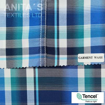 China Wicking Fashion Stock Tencel Polyesters Yarn Dyed Plaid Summer Shirt Wicking Causal Mens Clothes for sale