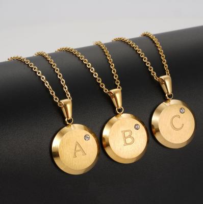 China CLASSIC Round Encrusted Stainless Steel Letter Necklace Plated With 18K Gold Titanium Steel Letter Pendant Necklace for sale