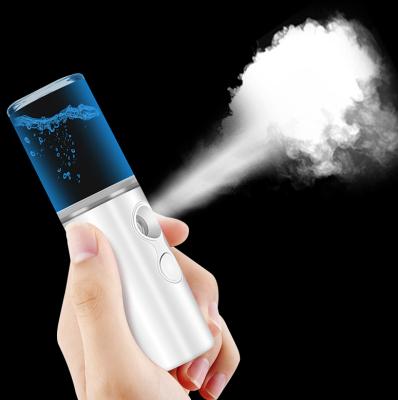 China Car Air Diffuser Desktop Mini Handheld Nano Outdoor Car Water Spray Replenish Skin Humidifier for sale