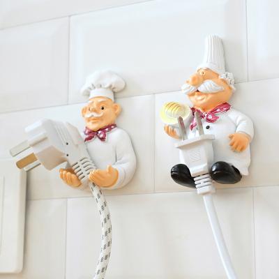 China Creative Europe Cartoon Power Cord Storage Holder Chef Hook Strong Adhesive Hook Socket Finishing Bracket for sale