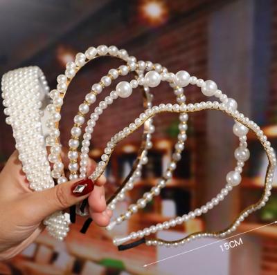 China Cheap sale Eco beaded headband stylish trend ladies bead headband hair ornaments designer for sale