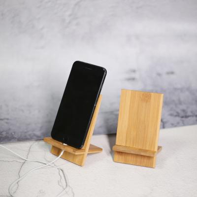 China PORTABLE Custom Logo Cell Phone Tablet Stand Bamboo Wooden Smart Phone Dock Desktop Charging Stand for sale