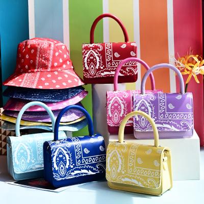 China The other small square 2021 female cashew flower printing bag shoulder handbag and hat large capacity swapping set for sale