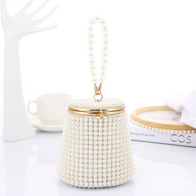 China 2022 High Quality Fashionable Ladies Handbag Elegant Pearl Inlaid Bucket Shape Women Mini Purse for sale