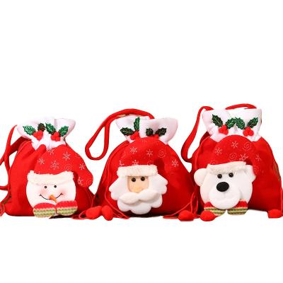 China Christmas Decorations Wholesale Red Candy Creative Cloth Handbag Christmas Gift Decal Drawstring Handbags Festival Gift Bag for sale