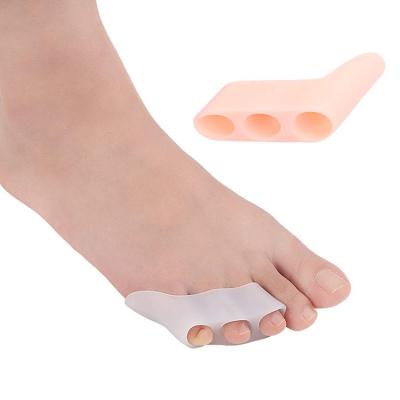 China Hot Selling Amazon Foot Orthotics 3 Holes Bunion Relief Bunion Corrector Bunion Toe Separator Pinkish Toe Separator As Seen On TV for sale