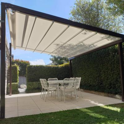 China Waterproof Outdoor Electric Retractable Pergola Party PVC Retractable Roof Windproof Roof Led Lights And Roller Shades for sale