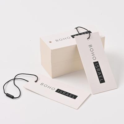 China Custom Luxury Recyled Garment Swing Tags Clothes Name Logo Printing Label Plastic Hang Tag With Twine Paper Hang Tags For Clothing Own Logo for sale