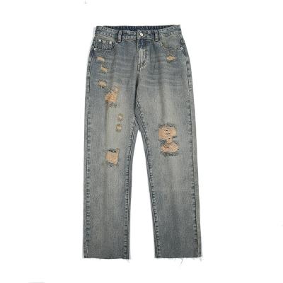 China Custom Embroidered Brand Style Logo QUICK DRY Patchwork Destroyed Stretch Denim Ripped Pants for sale