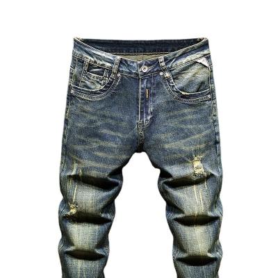 China Custom QUICK DRY Destroyed Jeans Ripped Skinny Jeans Men for sale