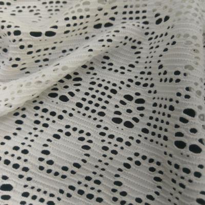 China Stretch Beach Cover-Up Knit Elastic Fabric Jacquard Mesh Crochet Fabric #DMTL-129 for sale