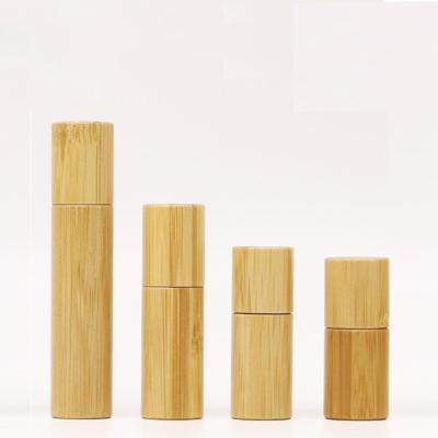 China Hot Selling Personal Care 1ml 3ml 5ml 10ml Roller Perfume Bamboo Glass Bottles Wooden Roll On Essential Oil Bottle Factory for sale