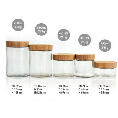 China Luxury Eco - Friendly Glass Packaging Container Glass Jar And Bottles With Bamboo Lid for sale