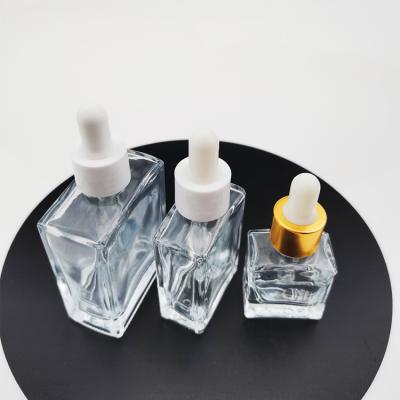 China Wholesale 1oz 30ml Rectangle Cosmetic Clear Square Flat Dropper Glass Bottle Empty Essential Oil Glass Bottle Refillable Perfume Bottles for sale